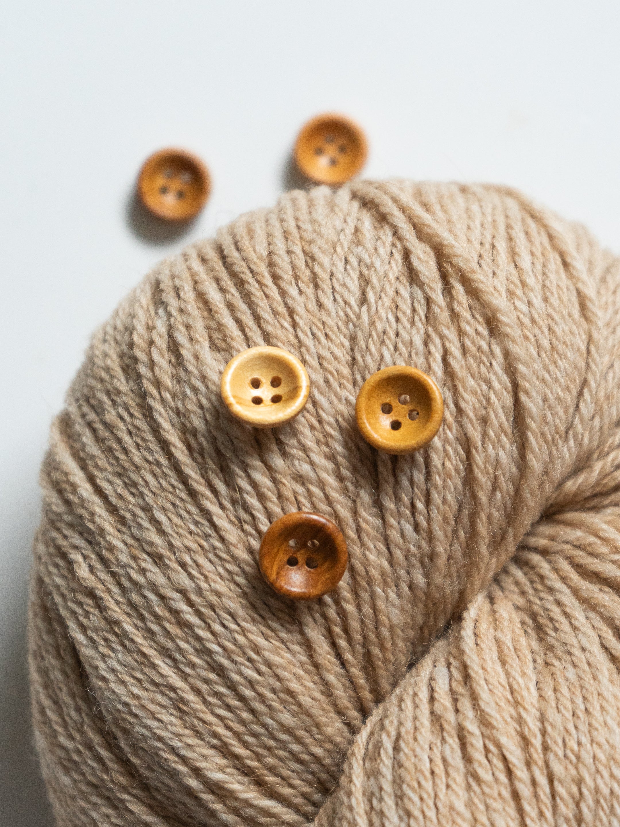 Riley <br/><small>12mm Wood Button</small>