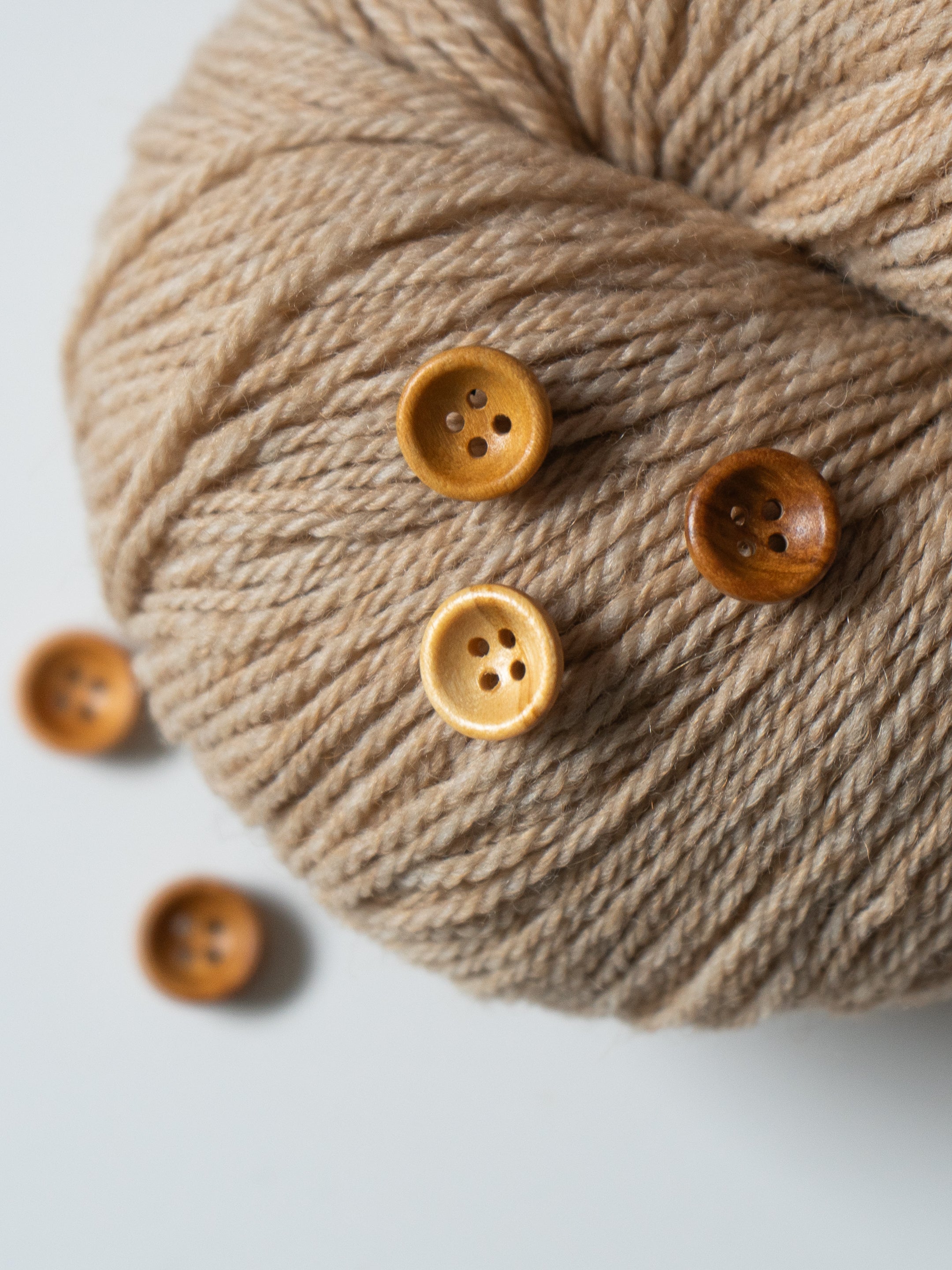 Riley <br/><small>12mm Wood Button</small>