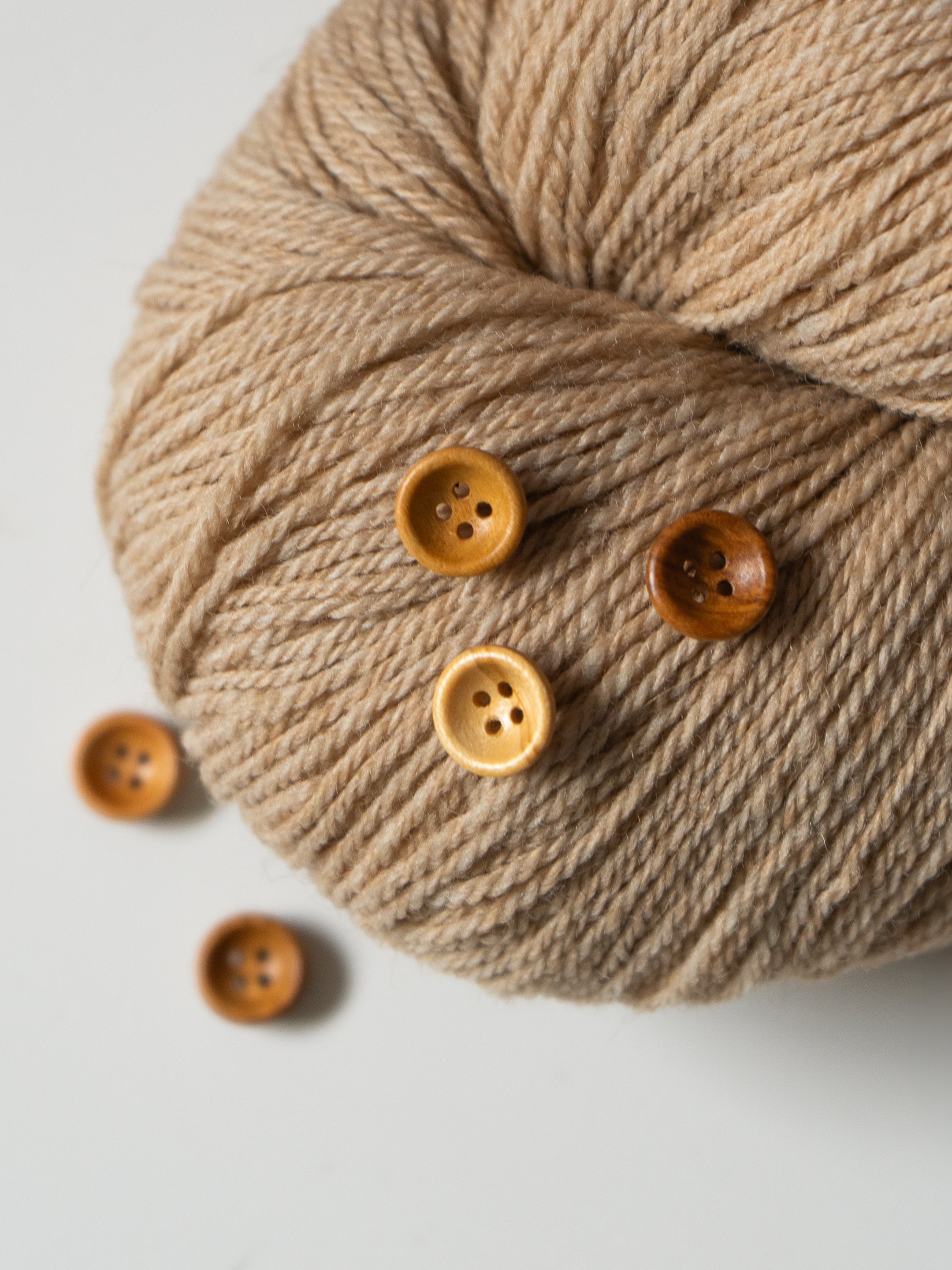 Riley <br/><small>12mm Wood Button</small>
