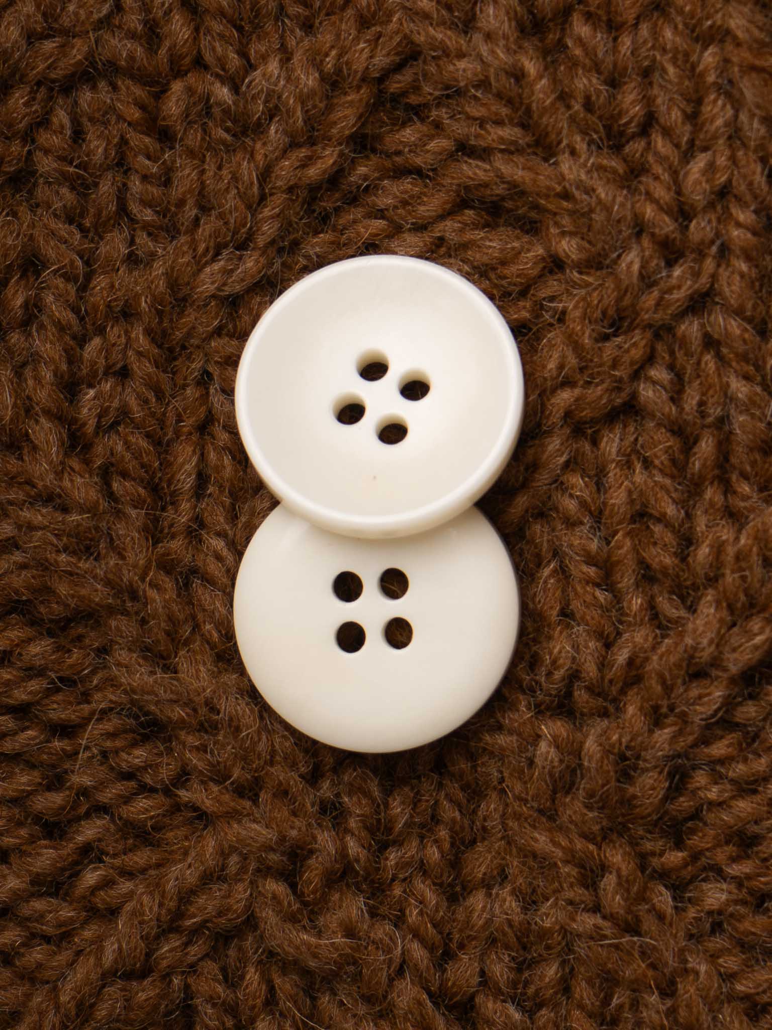 Titurnum <br/><small>15 - 20mm Bone Button</small>