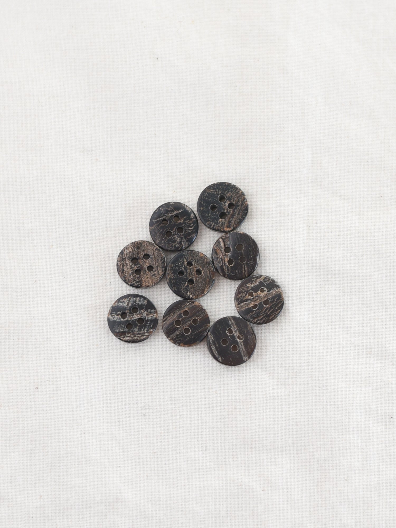 Earlie <br/><small>12mm Buffalo Horn Button</small>