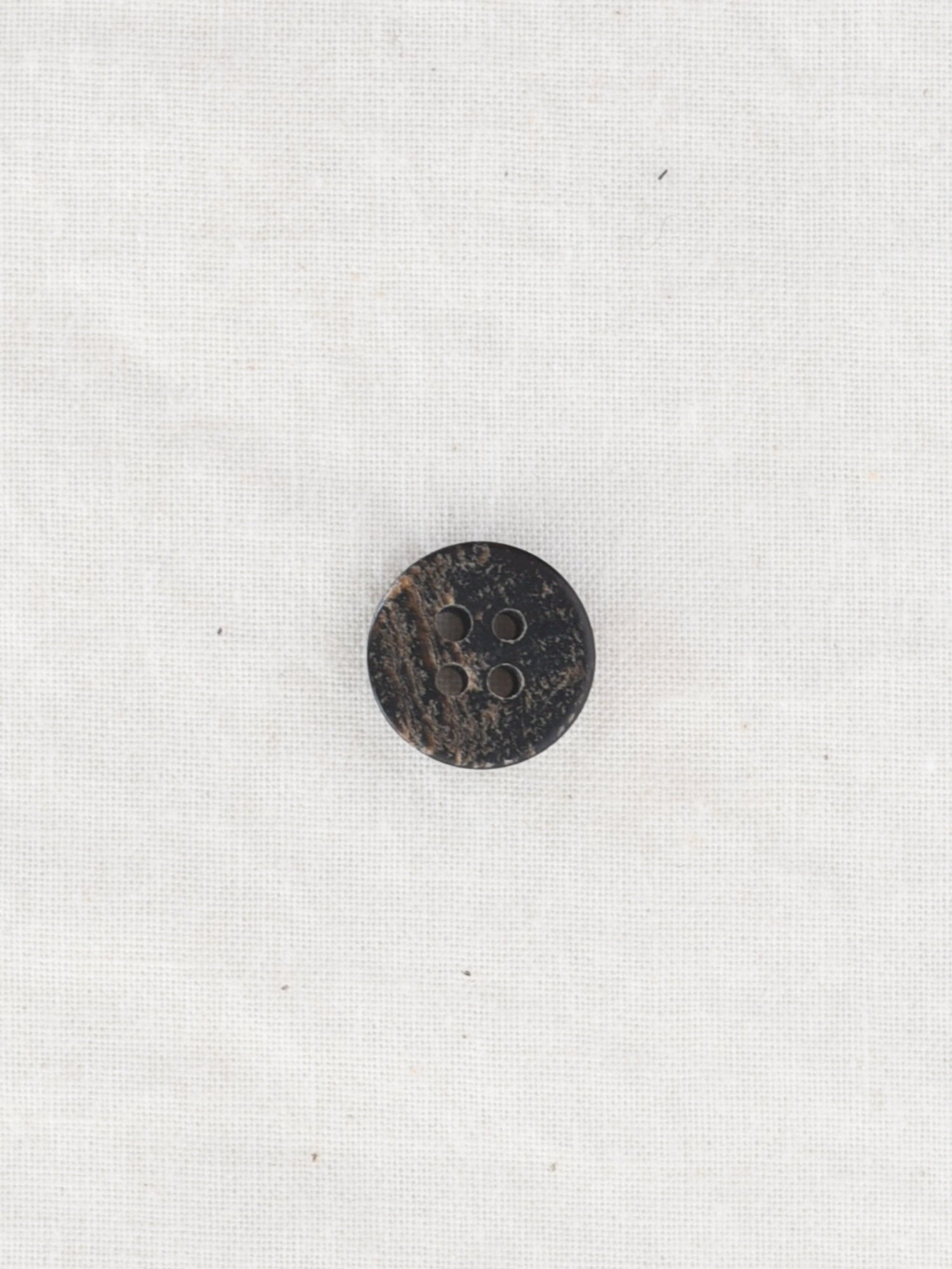 Earlie <br/><small>12mm Buffalo Horn Button</small>