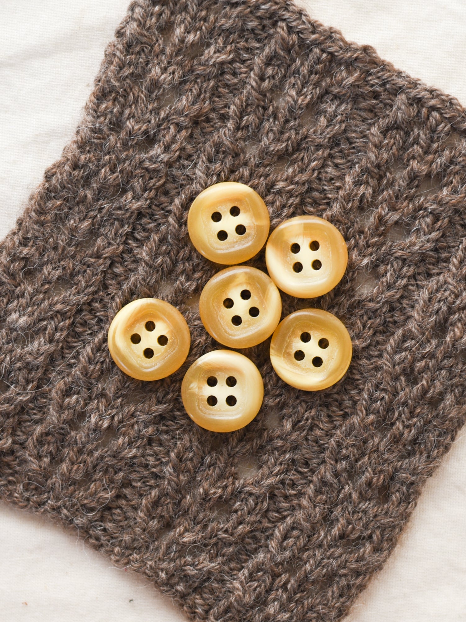 Yellow Bone Buttons <br/><small>knitting pattern</small>