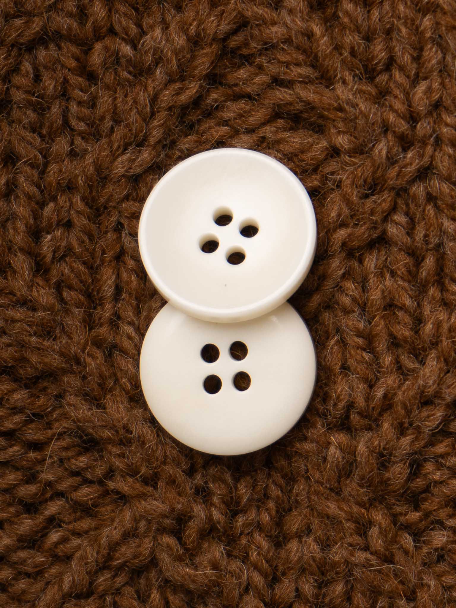 Titurnum <br/><small>15 - 20mm Bone Button</small>